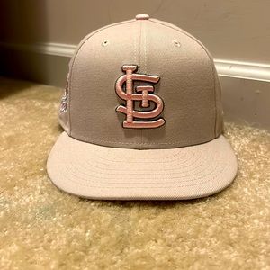 Two cardinals baseball hats one fitted and one adjustable